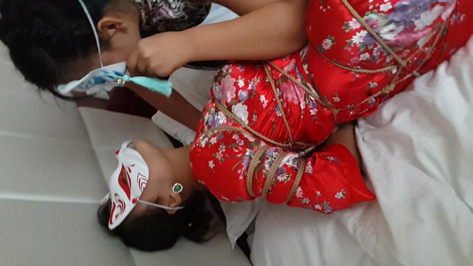 Pajama bondage Chinese girl in red pajama tied up in the hotel