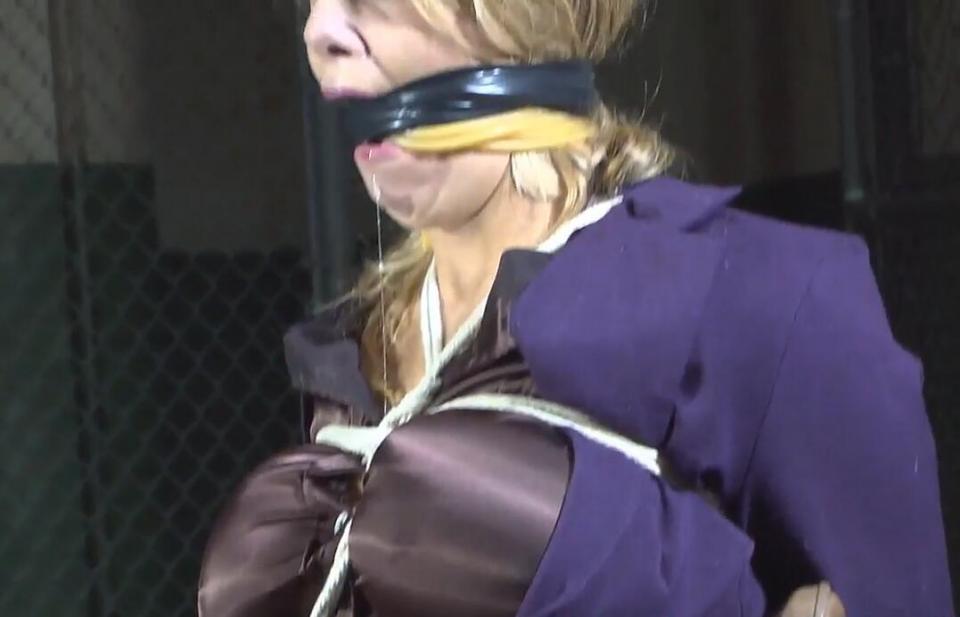 Cruel Gags for Carissa Montgomery - Part 2 Cruel Gags for Carissa Montgomery - Part 2<br>https://www.clips4sale.com/studio/8331/7867061/Cruel Gags for Carissa - Part 2<br>This clip starts where Part 1 ended... The man displays a very large industrial cleaning sponge to Carissa. She seems a little confused, but soon realizes what it is for. Yes, it is completely stuffed in her mouth. He then wraps her mouth with some kind of medical tape. He ties her other leg. He gropes her tits through her silky blouse, and then rubs his hands over her silky white panties. He gets more rope and adds a simple chest harness while Carissa endures the gag by moaning wiggling her legs as much as she is able. He removes the gag. He has been out looking for her car and he hasn't seen any car that he hasn't seen before. Her story sounds like a bunch of Malarkey to him, but she sticks with it. He cleave gags her with many wraps of latex tubing. Black tape is once again added to make the gag more effective. After all, he doesn't want her to disturb his neighbors. She is left once again. She can do nothing about the gag or the drool that starts to flow freely down her chin. After what seems like an eternity the man returns and removes the gag once again. 