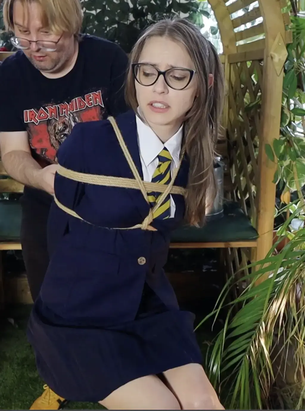 MADE IN ENGLAND! Noisy schoolgirl Chloe Toy explores an abandoned movie filming complex and gets cap MADE IN ENGLAND! Noisy schoolgirl Chloe Toy explores an abandoned movie filming complex and gets captured by a criminal, leaving her bound and gagged walking in many different movie sets 网盘不要解压下载后直接把后缀改为mp4<br>Hollyrope Omega的全球巡演到了英伦，这次遭殃的是五官细腻、肤白如纸的金发美女Chloe，颇具hot nerd气质，被摘下眼镜的瞬间堪称惊艳!穿着英伦风学生制服短裙、搭配白色长筒袜和黑色高跟鞋的Chloe在废弃的片场游荡，遭遇了隐匿其间的犯罪分子！残忍的罪犯先用扎带、后用麻绳牢牢捆住了少女的手腕，而后缚住了她的上臂和胸口，最后也没有放过那双穿着及膝袜的白嫩长腿，柔弱的少女哀嚎、挣扎却无力逃脱。不久后恶趣味的罪犯提出了一个奇怪的要求：解开Chloe脚上的绑绳，让少女在昏暗的片场里游荡，可怜的女孩战战兢兢地走过侦探片、情景剧和西部片的拍摄场景，同时奋力而徒劳地和嵌入上身的绳索搏斗、直至绝望力竭，从她惊恐的眼神里我们可以猜测，尾随而来的罪犯可能有一个更可怕的想法……<span style='color:#b0b0b0;'>[隐藏文字，购买后可见]</span><br><br>Chloe Toy was a student at the Catholic School for Women in London, but that morning she decided to skip class for one reason: she had always dreamed of exploring the abandoned movie studios across the street. The building had been shut down for years, its entrance forbidden—but Chloe managed to slip inside.<br><br><br>She wandered through the vast halls, marveling at the faded sets where iconic British films had once been shot: Mary Poppins vs. The Council Tax Inspector, The Extremely Mild Adventures of Nigel. Yet something felt wrong. The lights still worked. The air didn’t feel abandoned.<br><br><br>Suddenly, a hand clamped over her mouth, muffling her scream. A man with a strange accent dragged her into one of the sets. He admitted he was an international criminal hiding in London, using the deserted studio as his hideout. To make sure Chloe could not escape, he pulled her hands behind her back and cinched them tight with zip ties. Then, as if that weren’t enough, he wound ropes over the ties until her wrists ached.<br><br><br>Chloe begged and promised not to tell anyone if he let her go, while the bad hombre ties her body with more rope, but it was too late—she knew his secret. The man bound her legs, then stuffs a smelly pair of panties in her mouth and cruelly gags her wrapping duct tape around her head over her mouth. A super effective wraparound tape gag, then left her alone while he decided what to do. She struggled fiercely, twisting and pulling, but the bindings held firm. The gag is really effective, with the huge stuffing in her mouth and the tape tightly holding it.<br><br><br>When he returned, he offered a strange compromise: he would untie her legs and let her walk around the massive complex, as long as her hands stayed tied and her mouth gagged with the wraparound tape gag. She had no choice but to agree.<br><br><br>So Chloe wandered through the forgotten dreamscape of British cinema: the dungeon from "Sherlock Holmes and the Mystery of the Overpriced Pint", where the bad guy finds Chloe and spanks her ass a few times just for fun, the American diner from "Notting Hill 2: The Revenge of the Flatmate", the barn from the western "The Good, the Bad, and the Slightly Polite". Everywhere she went, she tugged at the restraints, but the zip ties and ropes were merciless.<br><br><br>At last, she stumbled into a lavish living room set, collapsed onto a dusty sofa, and fought her bonds until exhaustion overtook her. Unable to escape, she lay waiting—for rescue, or for whatever fate her captor decided.<br>