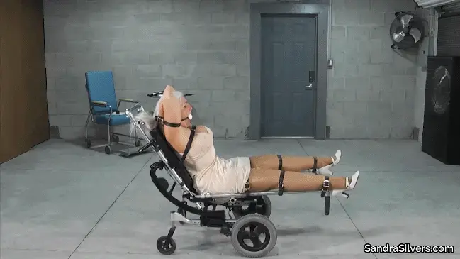 2676 Sandra Silvers and Caroline Pierce- Sexy Doctor Caroline Pierce Experiments with Orgasmic Wand  Sandra had been strapped down to a medical exam chair, custom built for the occasion, wearing only her satin slip, tan stockings over pantyhose, and white heels that match the giant ballgag stretching her jaw.  She hears the click of heels as her Doctor approaches…  The sexy surgeon - lab coat hanging open over green girdle and stockings - struts in to attend to her securely strapped, stunning, silver haired MILF. The plan for today’s experimental treatments includes ticklish toes raised temptingly<br><br><span style='color:#b0b0b0;'>[隐藏文字，购买后可见]</span>