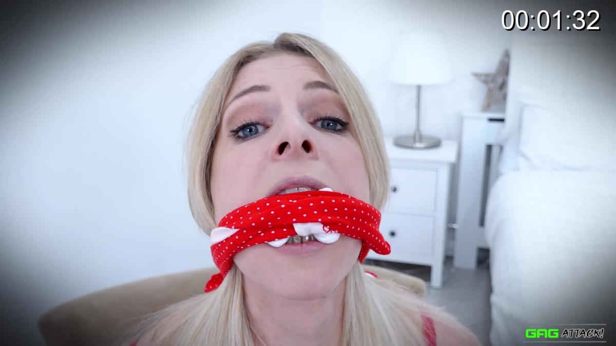 Rebecca Leah - Cloth Gagged Rebecca is captured wearing a red set of lingerie. She first gets a stuffed cleave gag before she is left alone by her captor. She tries to speak as much as she can through her gag without any succes. She struggles and gives you a lot of helpless DID looks.<br>Her captor returns and adds a white OTM gag to make it even harder for Rebecca to speak or get the first gag out. Rebecca does her best working the gag off and mmmmmmppphing the whole time while doing so. But there is no way she can get this tightly knotted OTM gag off or get out of her bondage.<br>Rebecca's captor returns only to add a last gag before leaving her alone. Rebecca now really destined to alarm anyone about her situation loudly MMMMPPPPHHHSS through her gag but all her attempts are futile nobody will save her. She can only hope that her captor returns to take her gags off...