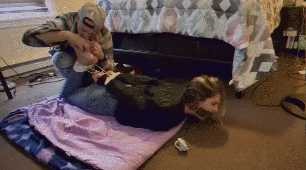 Hogtied, Sock Gagged and Tickled k is in her work clothes still and finds herself hogtied. she gets her shoes removed, her socks tickled for a minute before thee removed and shes gagged with them. Now that shes silenced the fun begins. She gets her barefeet tickled. Then she has her toes taped together to resttrain her more which drives her even crazier.