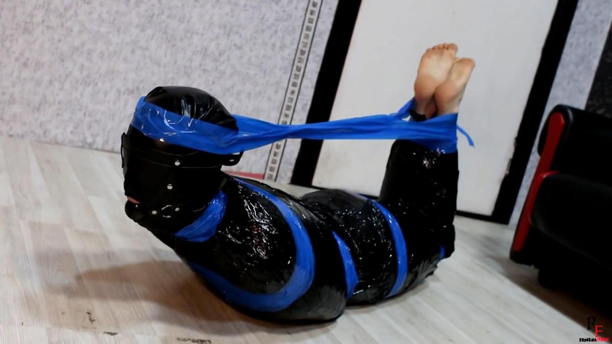 Nasty girl - tightly mummified and completely helpless  RF studio production <br>RussianFetish<br>Russian Fetish<br>Name - Natasha<br>Nation - Russian<br>Age - 22 y.o.<br>Height - 173 cm.<br>Response to mummification - she said that this time she was seriously frightened and began to panic in the plastic, especially when I started to pull her legs to her head (hogtie). She said also that she had had periodical fits of panic from the fact that she wasn't able to free herself without any help ...<br><br>Natasha in bondage, in quite hard one. Today I wrap her into the plastic in very hard way. She was topless because she knew that it will be very hot.<br>The entire clip is divided into three parts (all parts are contained in this clip):<br>I part - mummification. The beginning, the whole process is filmed. I wrapped her into the plastic, blindfolded and gagged her. The girl completely immobilized, she can only enjoy or suffer in this position.<br>II part - the pleasure of the captivity. The story of how helpless girl was mummified and helpless, she lies on the floor, moves and moans. Sometimes I went to her specifically to deliver more discomfort: to bind her to hogtie, to tickle her feet and to slap on the ass, or to move her helpless body on the floor<br>III part - attempt to break free. Natasha is struggling to get out, she's mummified for about half an hour, and she wants to go out. Time after time she attempts to break free, she's trying to break up plastic, but with no result. At the time when she is close to despair, I'm going to help and give to her free hand the scissors, so she continued on her way to freedom. She cheered by this fact, and with new continued to extricate herself.<br>Today was a real test for Natasha, and she took it well.<br> Category: MUMMIFICATION<br>Related Categories: FOOT FETISH, BONDAGE, BALLGAGGED, BLINDFOLDS.<br>Keywords: plastic wrap, mummi, mummified girl, plastic bondage, sensory deprivation, hard bondage, helpless girl, girl next door, russian girl, hogtied, hogtie.<br>