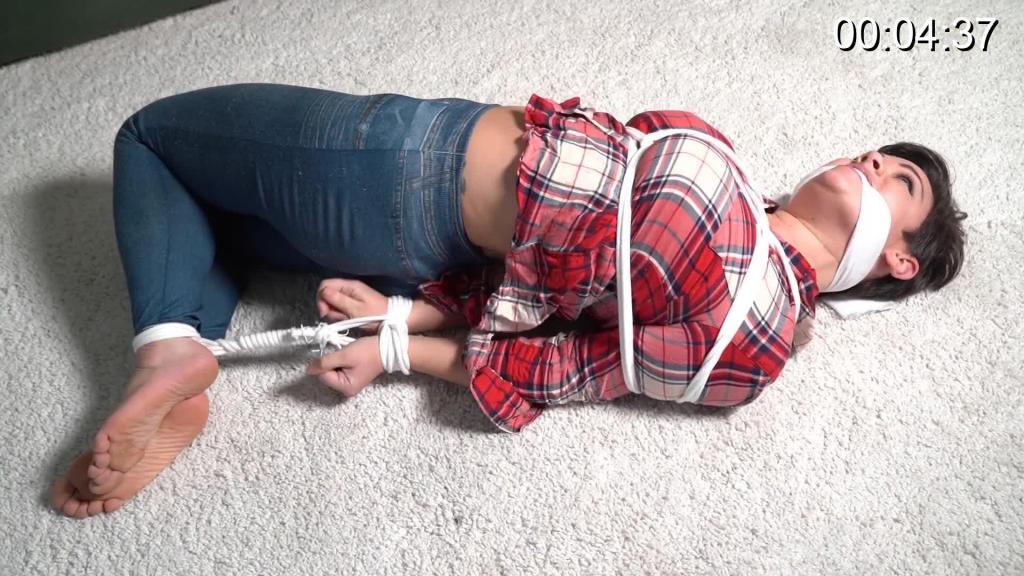 3066 Jesse in Hometime Bondage Offer Jesse is not ready to go home. She wants more bondage. She gags herself and waits for the ropes to be added. Barefoot and hogtied she is gagged with a strip of cloth.